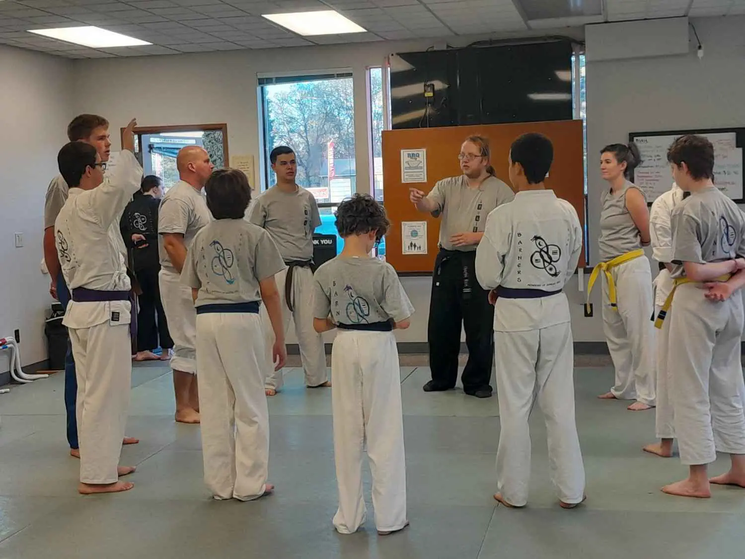 students learning basic martial arts techniques