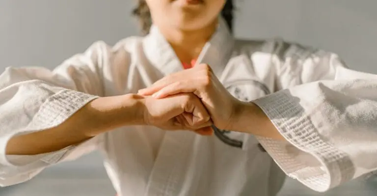 Student forming fists during taekwondo basics hand technique practice